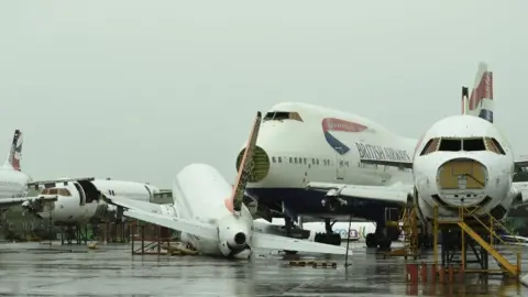 Craig Maunder Damage after a plane fell of its stand at ECube at Aerospace Business Park in St Athan, Barry