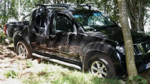 Cumbria Police The vehicle allegedly used to transport badly-injured Mr McKnight