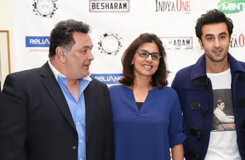 Getty Images Rishi Kapoor with his wife Neetu and son Ranbir