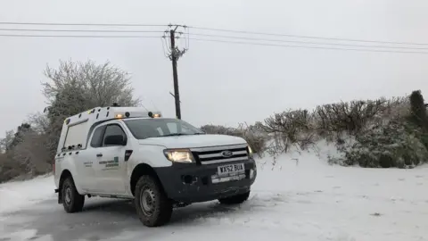 A Western Power Distribution vehicle in snow