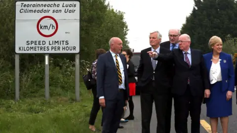 Getty Images European Commission (EC) member in charge of Brexit negotiations with Britain, Michel Barnier, is shown a border road between the Republic of Ireland and Northern Ireland on 12 May 2017