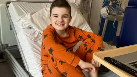 Jo Hill Finley in hospital getting treatment