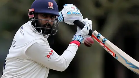 Getty Images Varun Chopra in action for Essex