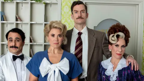 Trevor Leighton Left to right: Manuel (Hemi Yeroham), Polly (Victoria Fox), Basil (Adam Jackson-Smith) and Sybil (Anna-Jane Casey) in a promotional cast picture for the stage adaptation of Fawlty Towers