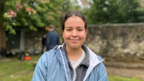 Kirsty Little - wearing a light blue jacket