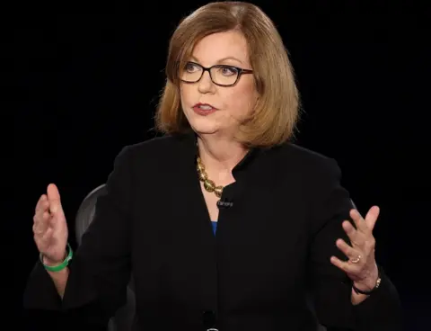 Getty Images Susan Page moderates the Vice President debate