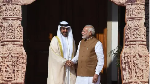 AFP Indian Prime Minister Narendra Modi (R) welcomes Sheikh Hamed Bin Zayed Al Nahyan, Chairman of the Crown Prince Court of Abu Dhabi, to the founding conference of the International Solar Alliance in New Delhi on March 11, 2018.