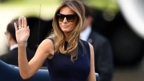 Gallo Images US First Lady Melania Trump pictured wearing sunglasses and waving