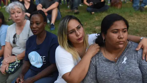 Reuters Mourners gather at a vigil after seven people were killed and at least 222 injured in a mass shooting in Texas