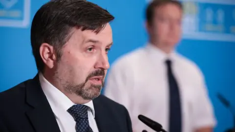 PA Media Robin Swann