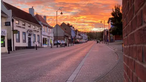 The sun rises over Tidworth's high street