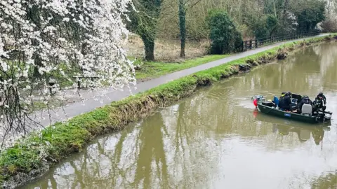 A search boat on the river