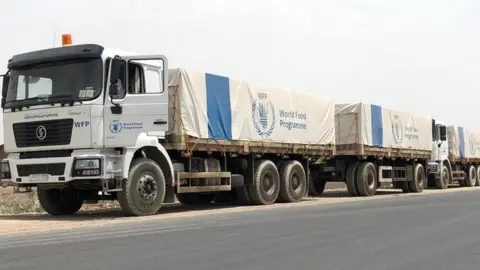 WFP World Food Programme truck convoy on road in Afar