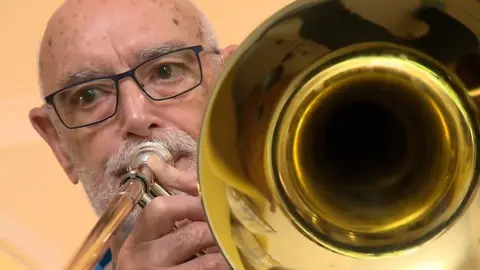 Colin Nicholls playing the trombone