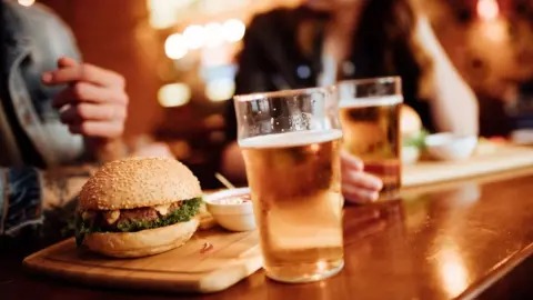 Getty Images A burger and a pint of beer