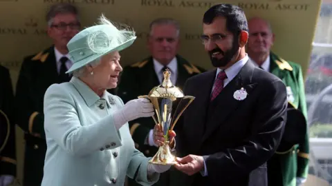 PA Media The Queen presents the Gold Cup to Sheikh Mohammed Al Maktoum at Ascot in 2012