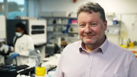 PA Media Dr Conall McCaughey