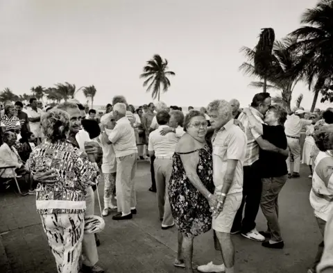 Barry Lewis Elderly couples dance together on Miami Beach