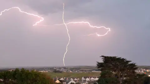 Two strikes of lightning above Bude in Cornwall. 