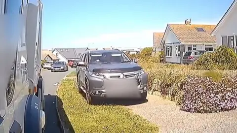 Cornwall Council Car on pathway