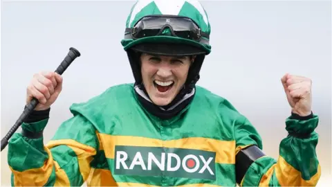 PA Media Rachael Blackmore celebrates winning the Randox Grand National