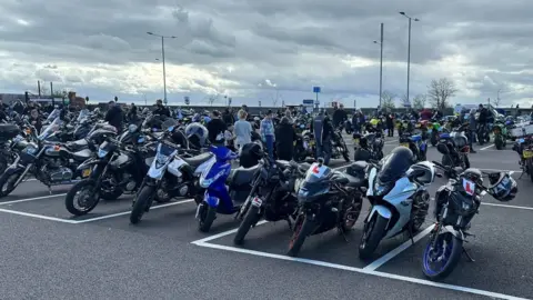 Jared Prentice Motorbikes parked in a row in a car park