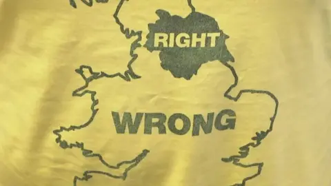 A t-shirt with a map of the UK. The word 'Right' is written over Yorkshire and the word 'Wrong' is over the rest of the country.