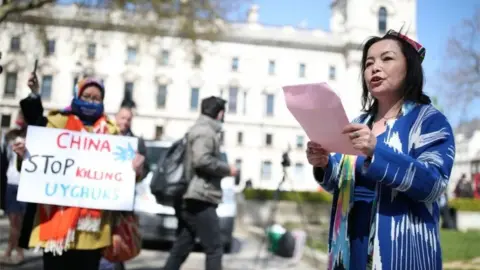 PA Media Protest against Uyghur genocide in Parliament Square