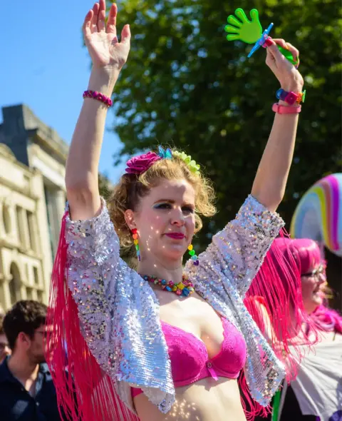 Mark Lewis A woman enjoying Cardiff Pride 2022