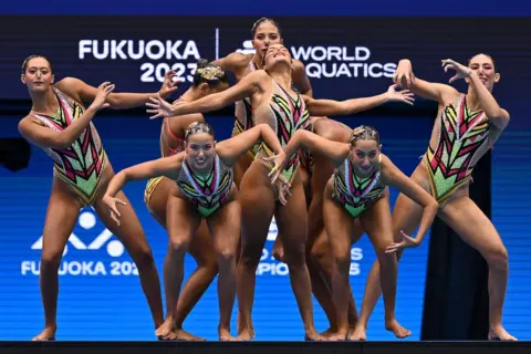 Quinn Rooney/Getty Images Team Egypt doing acrobatics.