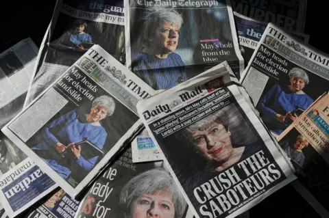 Getty Images Newspaper front covers featuring coverage of May's 2017 snap election