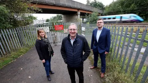Durham County Council Councillor Elizabeth Scott (left), Sedgefield MP Paul Howell (centre) and Craig MacLennan, the council's transport and infrastructure projects manager