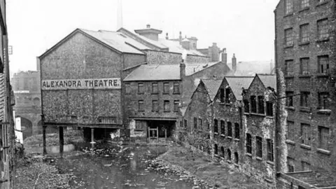 www.picturesheffield.com The Sheaf from Exchange St before being covered over in 1917, slaughterhouses seen on the left