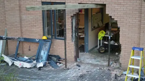BBC Hole in wall after car crashed into Bronglais Hospital, Aberystwyth