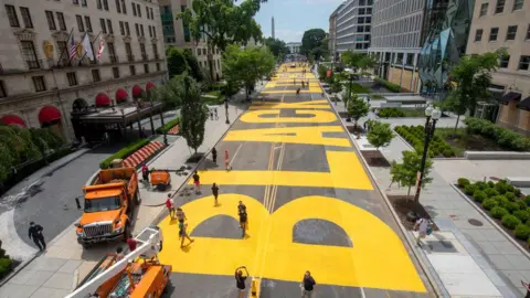 Getty Images Black Lives Matter painted in yellow on the street leading up to the White House