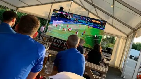 House of Feasts TV in marquee