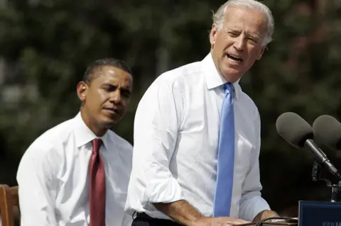 Getty Images Mr Biden speaks in 2008 after being formally introduced as Barack Obama's running mate