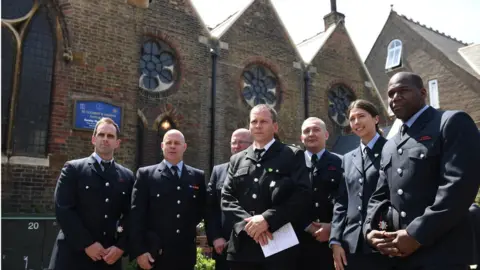 PA Members of the fire brigade from Ladbroke Road Station