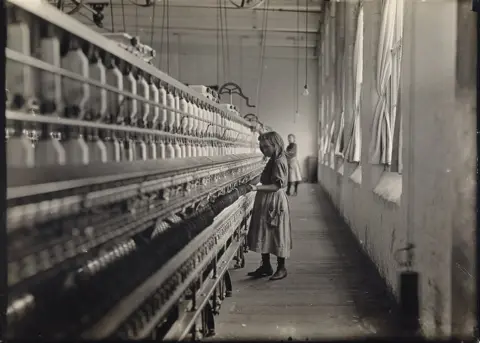 Courtesy of Swann Auction Galleries A small girl working at a mill.