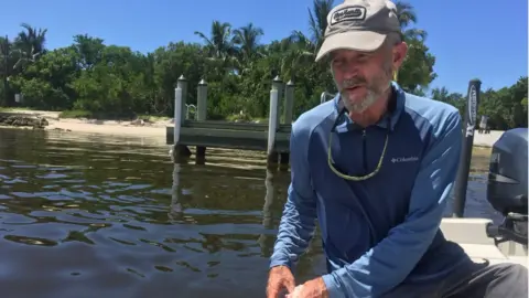 Carlos Serrano Dr Bartleson in a boat