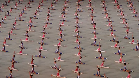 Reuters Children doing a gymnastics performance