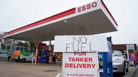 Getty Images A "no fuel" sign outside a filling station in Streatham, London