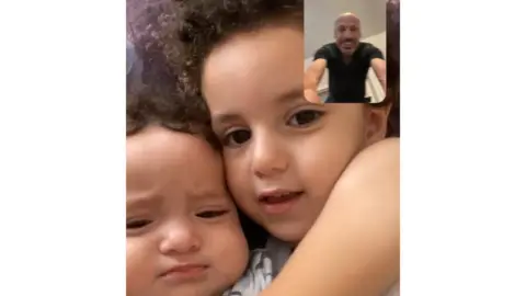 The Seddiq Law Firm A FaceTime call between Mr Younis and his children