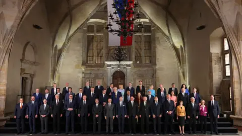 Sean Gallup/Getty Images Leaders of nations of the European Political Community (EPC) as well as the European Commission and the European Council pose for a photo during the inaugural meeting of the EPC at Prague Castle on October 06, 2022