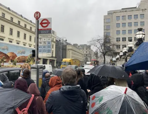 BBC Bus passengers queuing