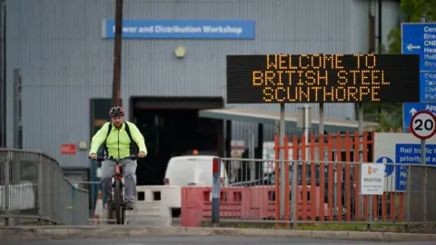 Getty Images Steelworker at British Steel plant in Scunthorpe