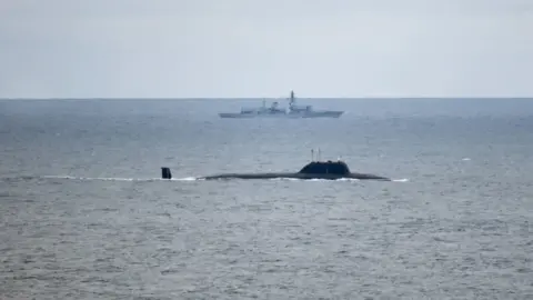 PA Media British submarine hunter HMS Portland tracking Russian cruise missile submarine Severodvinsk in the North Sea, north west of Bergen, Norway