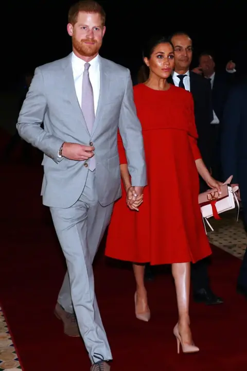 EPA Britain's Prince Harry, Duke of Sussex (L) and his wife Meghan, Duchess of Sussex arrive at the Casablanca Airport, in Casablanca, Morocco