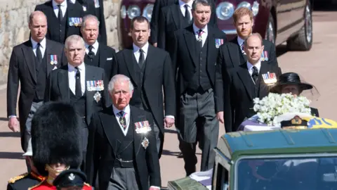 Getty Images Senior royals walked behind Prince Philip's coffin during a televised procession