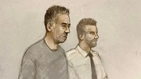 Court artist sketch by Elizabeth Cook of Paul Butler (left) appearing at Plymouth Magistrates' Court. He has black and grey hair and is wearing a grey tracksuit